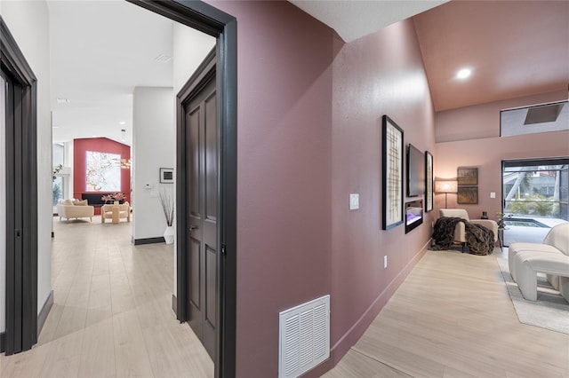 5809 Cruiser Way, Tampa, FL 33615 - hall featuring plenty of natural light, light wood-style flooring, and recessed lighting