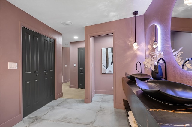 5809 Cruiser Way, Tampa, FL 33615 - bathroom with double vanity and recessed lighting