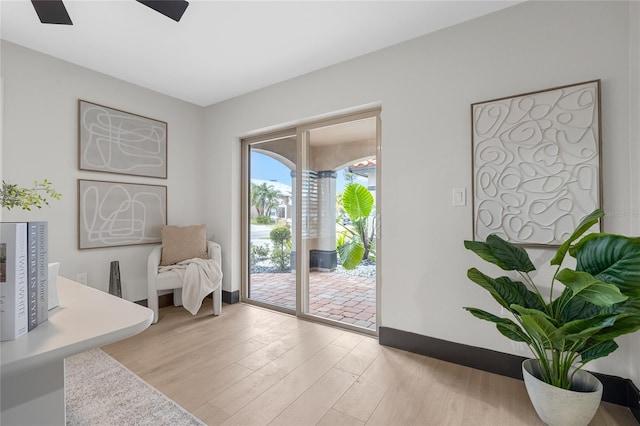 5809 Cruiser Way, Tampa, FL 33615 - living area featuring wood finished floors and a ceiling fan