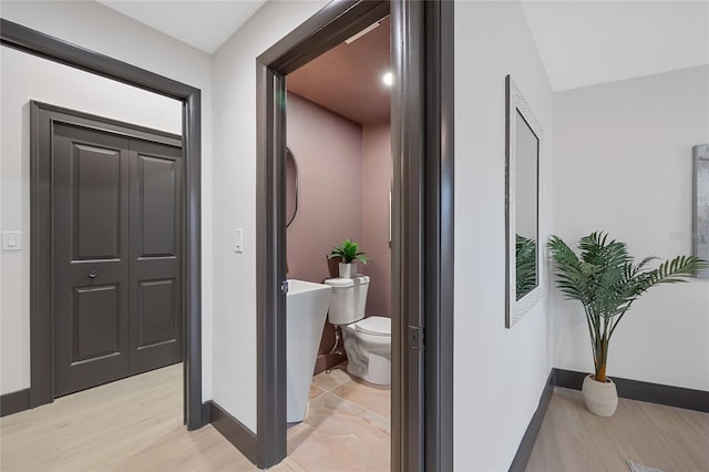 5809 Cruiser Way, Tampa, FL 33615 - bathroom featuring toilet and wood finished floors