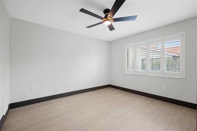 5809 Cruiser Way, Tampa, FL 33615 - unfurnished room featuring light wood-style flooring and a ceiling fan