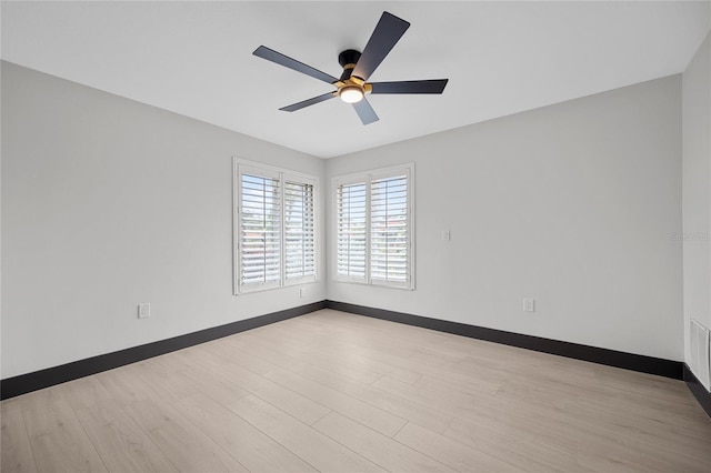 5809 Cruiser Way, Tampa, FL 33615 - unfurnished room with a ceiling fan and wood finished floors