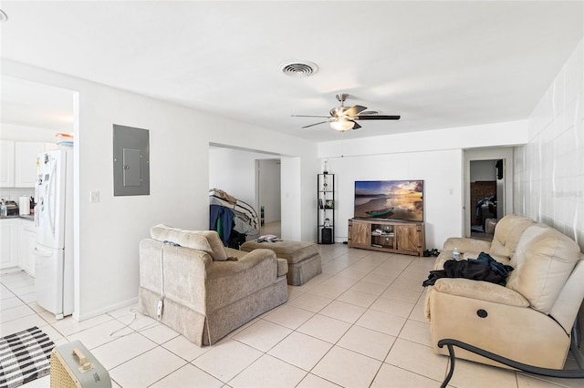 27284 Sunnybrook Rd, Punta Gorda, FL 33983 - living room with light tile patterned floors, electric panel, and ceiling fan