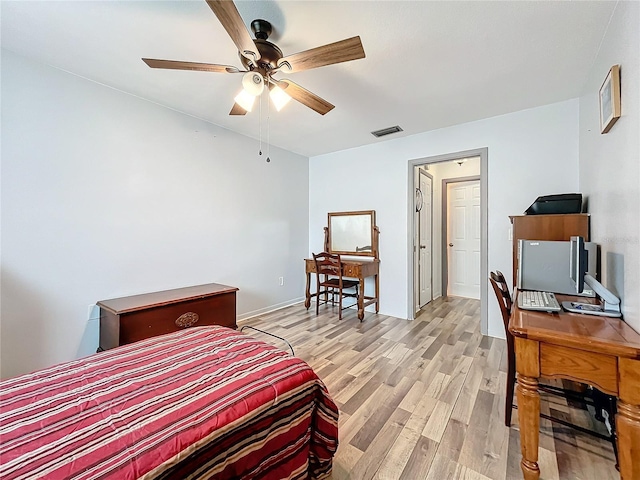 bedroom featuring ceiling fan and light wood-type flooring