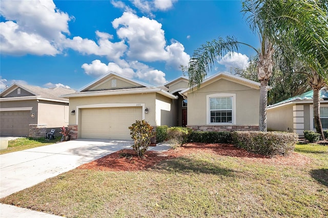 ranch-style house with a garage and a front lawn