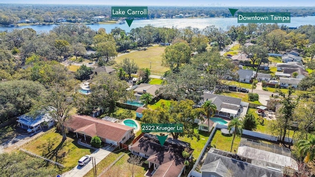 birds eye view of property featuring a water view