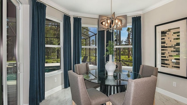 dining area featuring crown molding and a chandelier