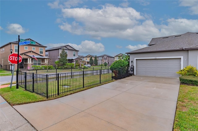 exterior space featuring a garage and a yard