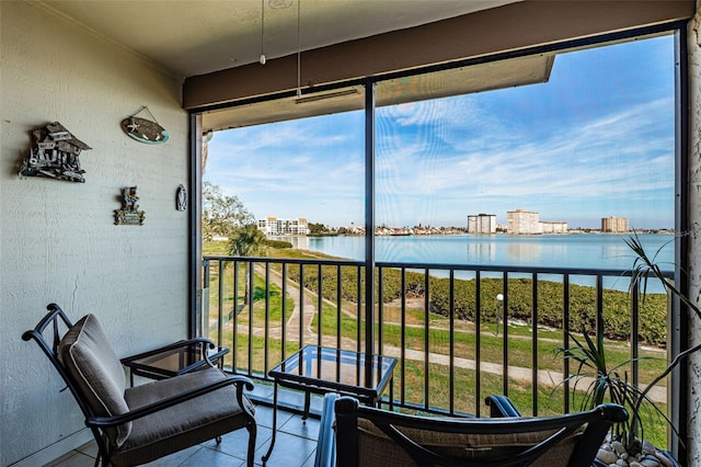 sunroom with a water view