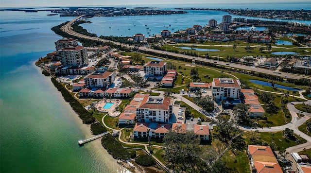 bird's eye view featuring a view of city and a water view