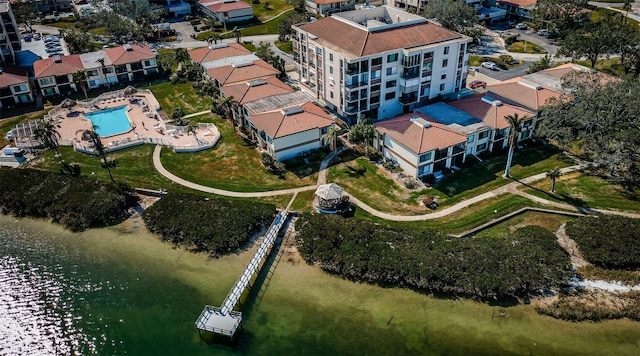 bird's eye view featuring a water view and a residential view