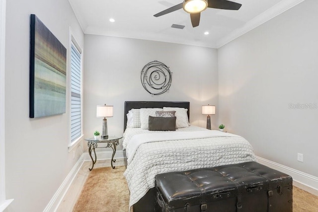 bedroom with multiple windows, crown molding, and ceiling fan