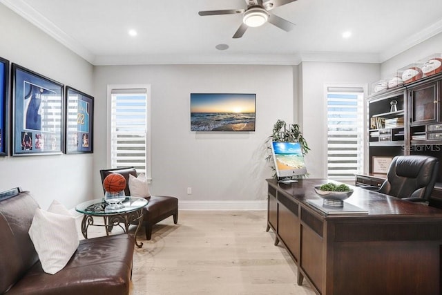 home office featuring ornamental molding, a healthy amount of sunlight, ceiling fan, and light hardwood / wood-style floors