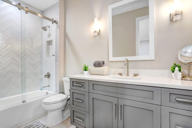 full bathroom featuring vanity, toilet, and combined bath / shower with glass door