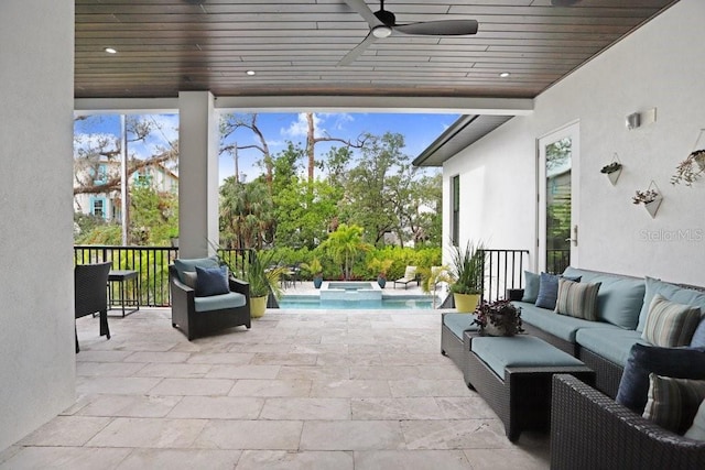 sunroom / solarium with ceiling fan and wooden ceiling