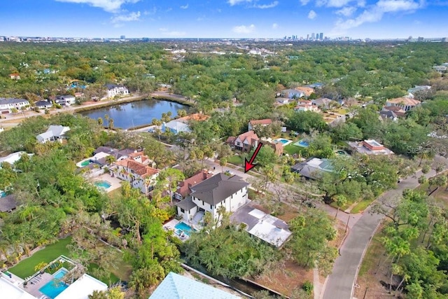 drone / aerial view with a water view