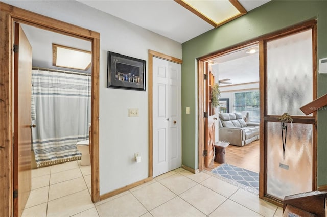 interior space with light tile patterned floors