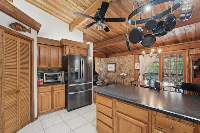 kitchen with stainless steel refrigerator with ice dispenser, ceiling fan, wood ceiling, and light tile patterned flooring