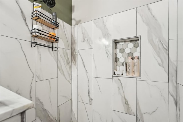 bathroom featuring tiled shower