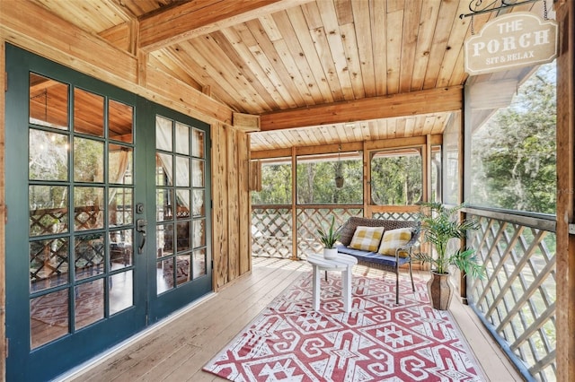 sunroom / solarium with vaulted ceiling with beams and wood ceiling