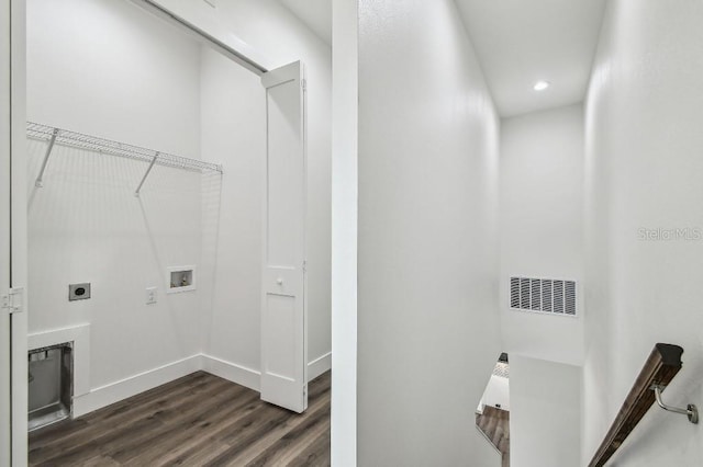 laundry area with electric dryer hookup, washer hookup, and dark hardwood / wood-style flooring