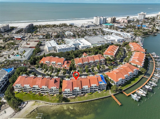 aerial view featuring a water view and a view of the beach