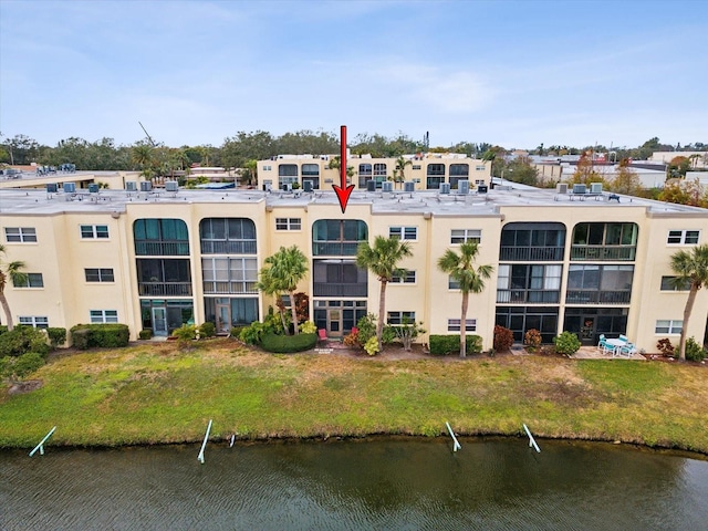 view of building exterior with a water view