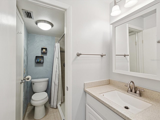 bathroom with walk in shower, vanity, tile patterned floors, and toilet