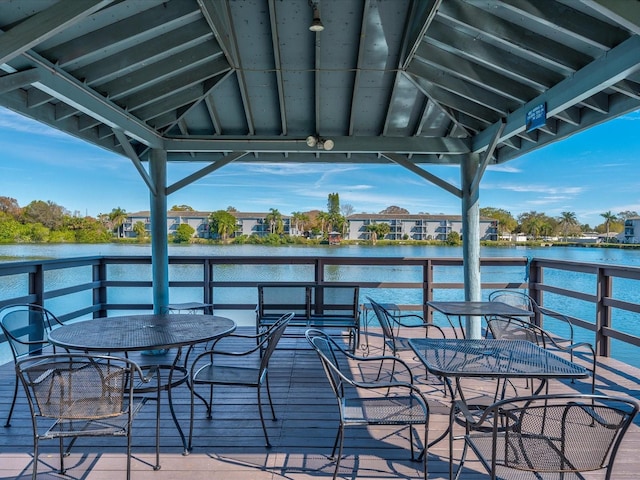 dock area with a gazebo and a water view