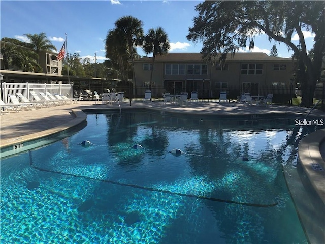 view of swimming pool featuring a patio area