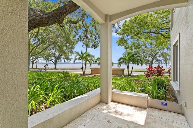 view of patio / terrace with a water view