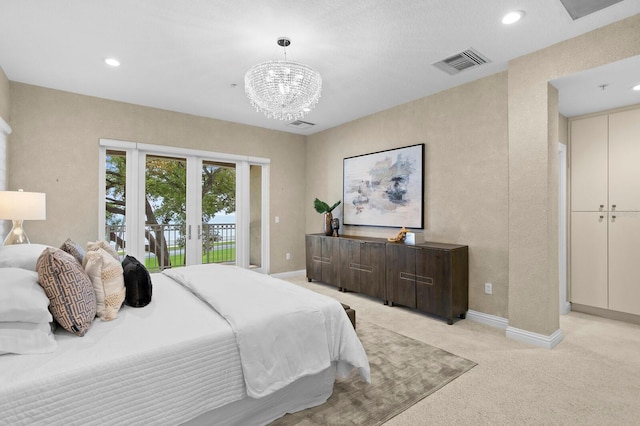 bedroom featuring visible vents, light carpet, baseboards, and access to outside