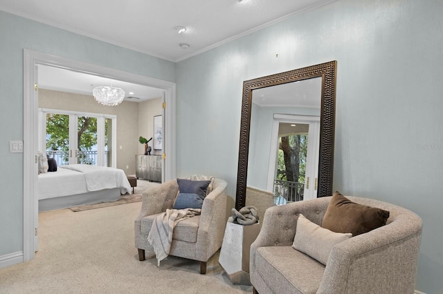 bedroom featuring access to exterior, baseboards, ornamental molding, carpet floors, and french doors