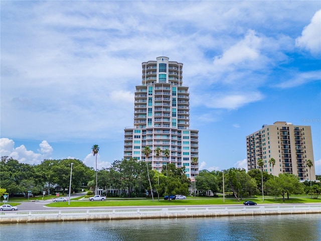 view of building exterior with a water view