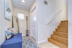 interior space with tile patterned floors