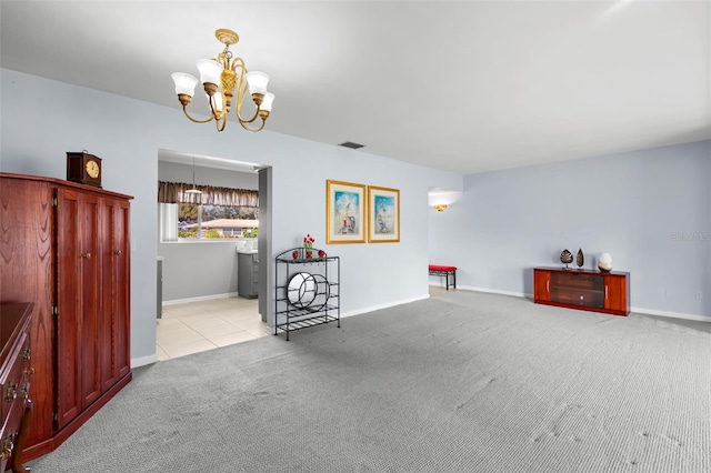 interior space featuring light colored carpet and a chandelier