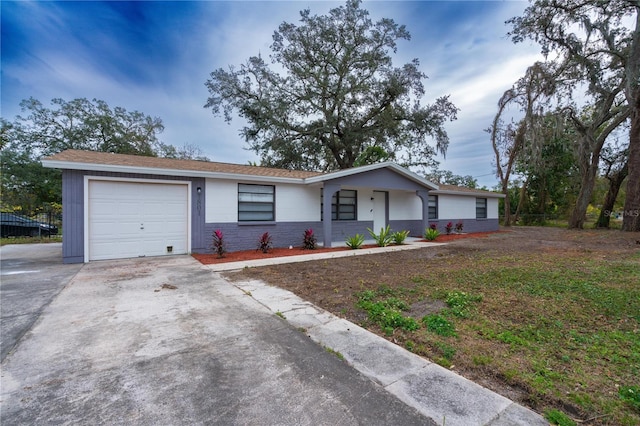 single story home with a garage