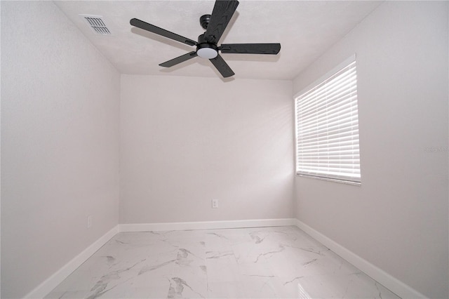 empty room featuring ceiling fan