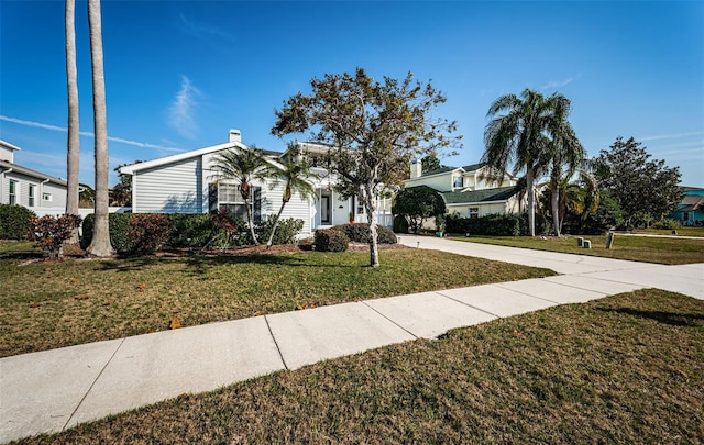 view of front facade with a front lawn