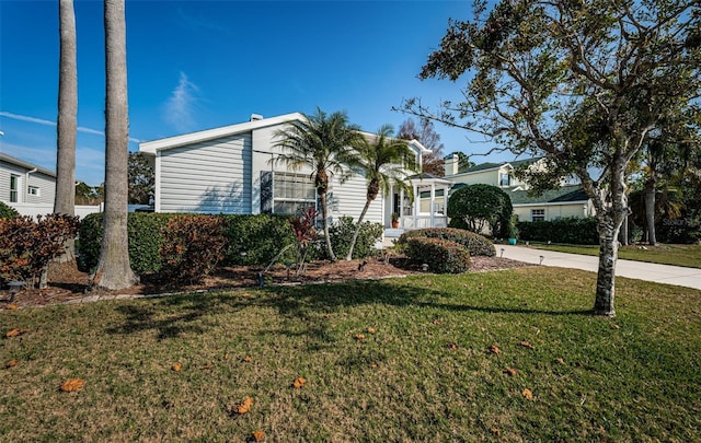 view of front of house with a front lawn