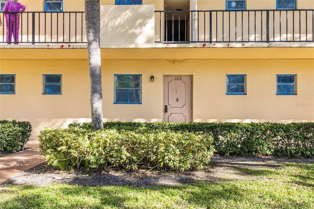 doorway to property featuring a balcony