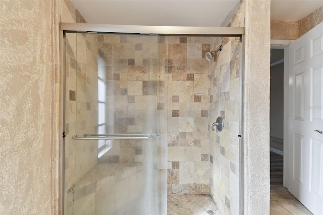 bathroom featuring walk in shower