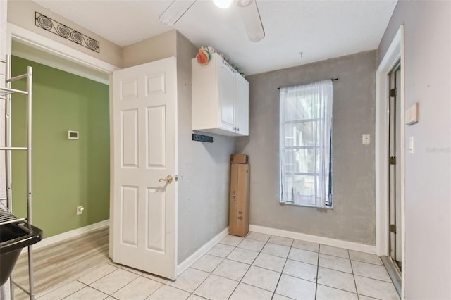 interior space with light tile patterned floors