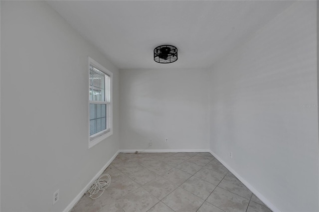 view of tiled spare room