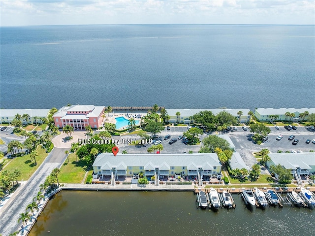 birds eye view of property featuring a water view