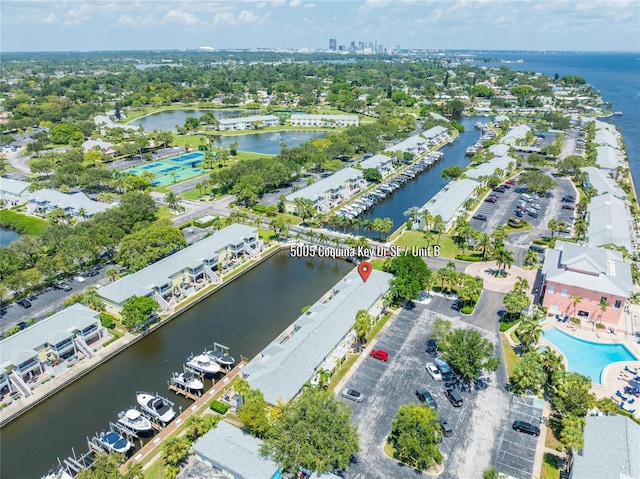 birds eye view of property featuring a water view