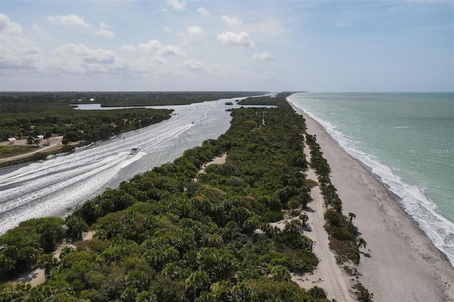 bird's eye view featuring a water view and a view of the beach