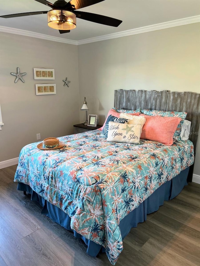 bedroom with ceiling fan, crown molding, and hardwood / wood-style flooring