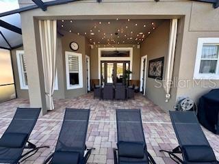 view of patio / terrace with glass enclosure