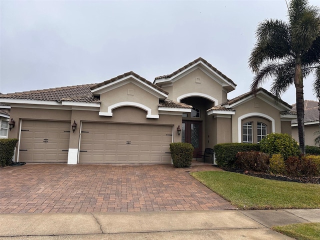 view of front of property featuring a garage